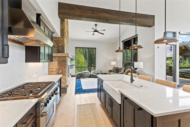 This immaculately maintained riverfront mountain residence is - photo 11