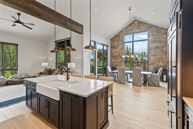 This immaculately maintained riverfront mountain residence is - photo 12