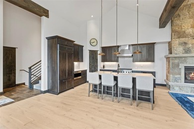 This immaculately maintained riverfront mountain residence is - photo 14