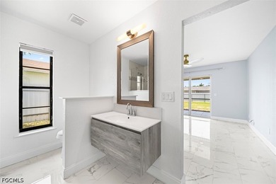 Welcome home to this beautifully remodeled 3-bedroom, 2-bathroom - photo 16