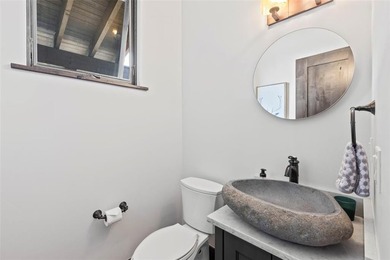 This immaculately maintained riverfront mountain residence is - photo 29