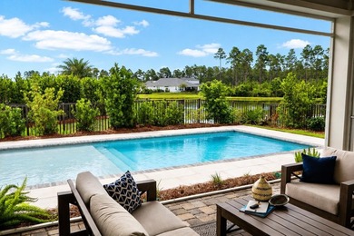 Check out the new pool deck & landscaping! Enjoy an amenity-rich - photo 2