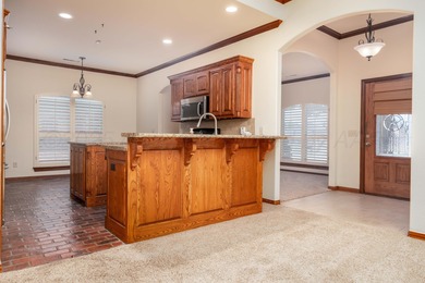 Welcome to this immaculate home with eat-in kitchen that has