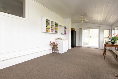 Looking for a home with a beautiful lake view? This inviting - photo 11