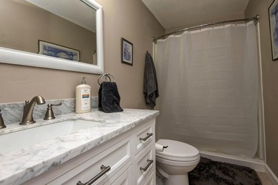 Looking for a home with a beautiful lake view? This inviting - photo 21