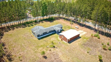 Escape to the pines with this partially furnished 2 bed, 2 bath - Lake Home Sale Pending in New Lisbon, Wisconsin