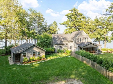 A level lot. A walk-in sandy beach. Over 200 feet of Lake - photo 2