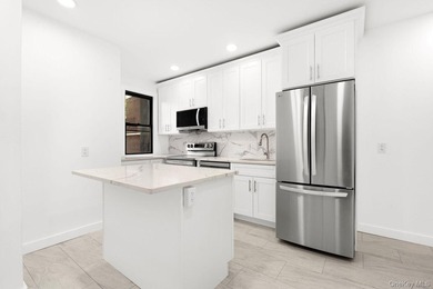 Welcome to 346 E 53rd St., a beautifully renovated semi-detached - photo 4