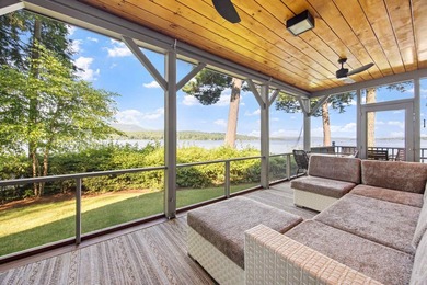 A level lot. A walk-in sandy beach. Over 200 feet of Lake - photo 7