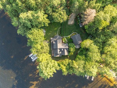 A level lot. A walk-in sandy beach. Over 200 feet of Lake - photo 8