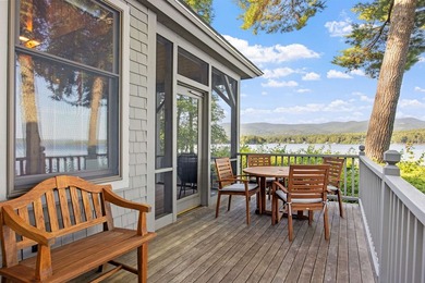 A level lot. A walk-in sandy beach. Over 200 feet of Lake - photo 9