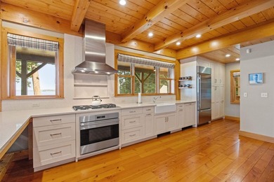 A level lot. A walk-in sandy beach. Over 200 feet of Lake - photo 10