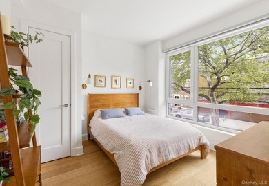 Welcome to The Rutland, a modern condominium in the heart of - photo 4