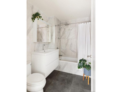 Welcome to The Rutland, a modern condominium in the heart of - photo 5