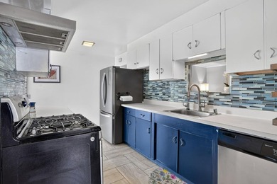 Tucked behind a charming brick-enclosed patio, this 3 bedroom - photo 11