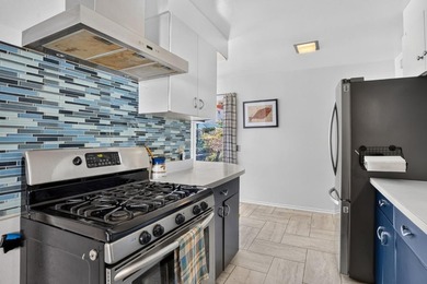 Tucked behind a charming brick-enclosed patio, this 3 bedroom - photo 12