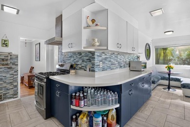 Tucked behind a charming brick-enclosed patio, this 3 bedroom - photo 13