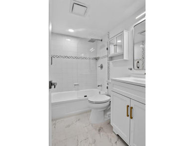 Welcome home! This freshly renovated, 3rd-floor 2-bed, 1.5-bath - photo 16
