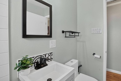Tucked behind a charming brick-enclosed patio, this 3 bedroom - photo 19