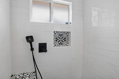 Tucked behind a charming brick-enclosed patio, this 3 bedroom - photo 20