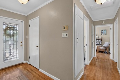 Tucked behind a charming brick-enclosed patio, this 3 bedroom - photo 21