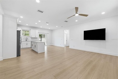 Virtually Staged. Welcome to your slice of modern Florida living - photo 3