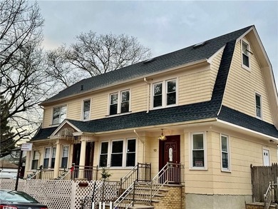 This exceptional 2-family side by side home, sits on a generous - photo 1