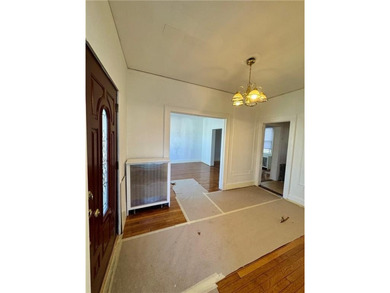 This exceptional 2-family side by side home, sits on a generous - photo 3
