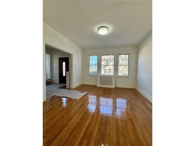 This exceptional 2-family side by side home, sits on a generous - photo 4