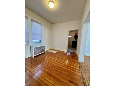 This exceptional 2-family side by side home, sits on a generous - photo 5