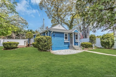 Tucked away on a quiet one-way street in the heart of West Islip - photo 1