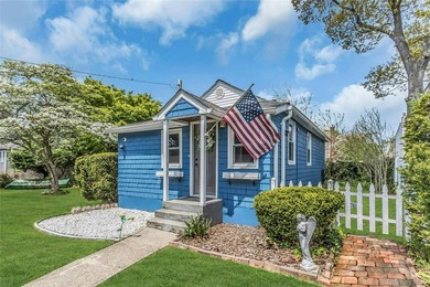 Tucked away on a quiet one-way street in the heart of West Islip - photo 2