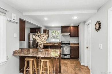 Tucked away on a quiet one-way street in the heart of West Islip - photo 9