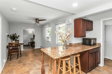 Tucked away on a quiet one-way street in the heart of West Islip - photo 10