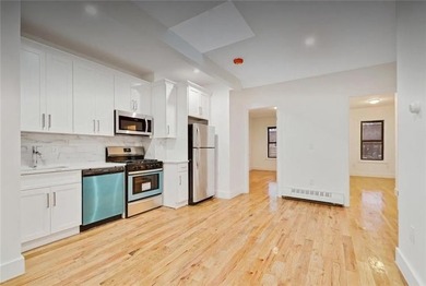 Located in the growing neighborhood of East New York, this - photo 3