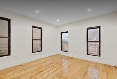 Located in the growing neighborhood of East New York, this - photo 4