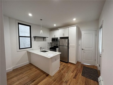 Located in the growing neighborhood of East New York, this - photo 6