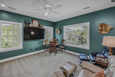 Modern comfort meets relaxed lake living on this spacious 1-acre - photo 12