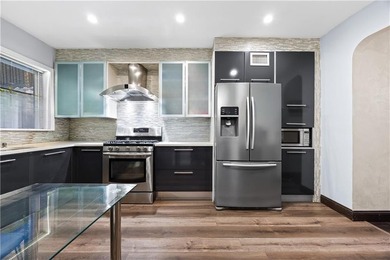 Two-Family Fully Brick Home in Sheepshead Bay with 3 Parking - photo 3