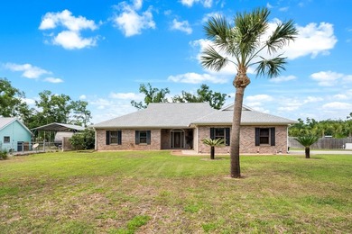 This brick beauty in the heart of Steinhatchee, that's Flood - photo 3