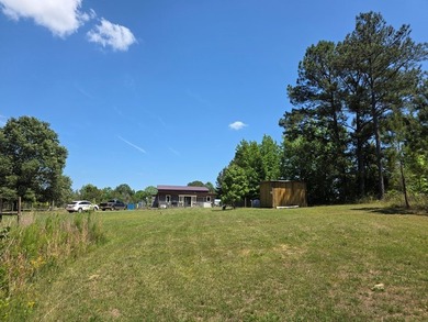 Priced to Sell Quick! Acreage, home, barn, and lake life! This - photo 44