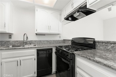 Welcome to this bright and inviting top-floor condominium in one - photo 11