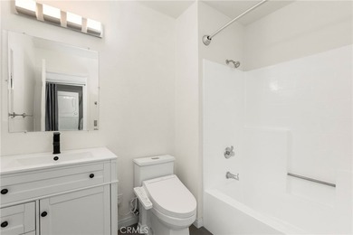 Welcome to this bright and inviting top-floor condominium in one - photo 18