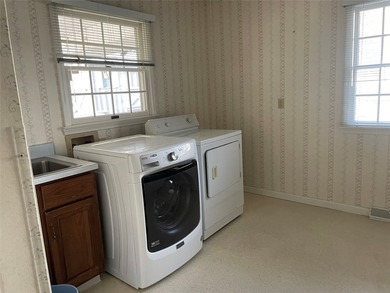 Large home with open living space in desirable SW Millcreek