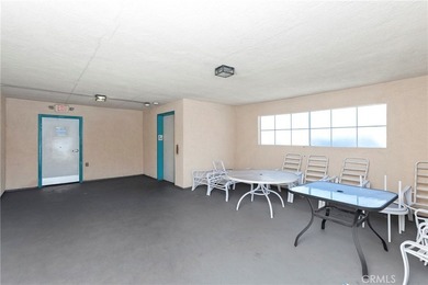 Welcome to this bright and inviting top-floor condominium in one - photo 23