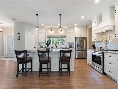 Discover elegance in the Lakes Area with this immaculately - photo 2