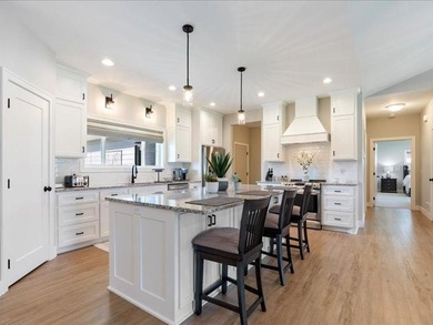 Discover elegance in the Lakes Area with this immaculately - photo 3
