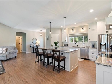 Discover elegance in the Lakes Area with this immaculately - photo 4