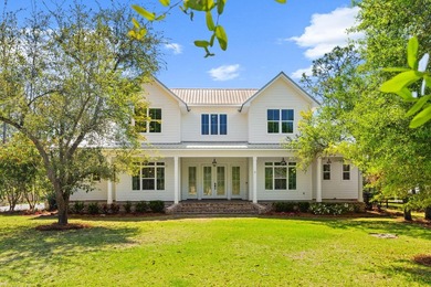 Nestled on 1.38 gated & fenced acres, this custom-built home - photo 2