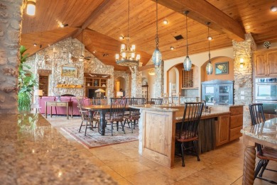Stunning custom home on gorgeous 35.04 acres (per plat) within